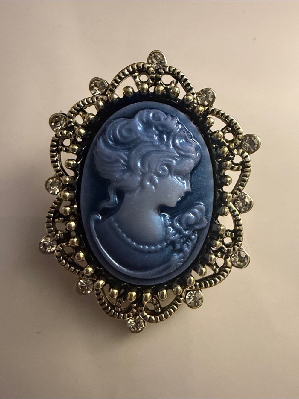 Vintage-Style Blue Cameo Brooch with Ornate Gold-Tone Frame